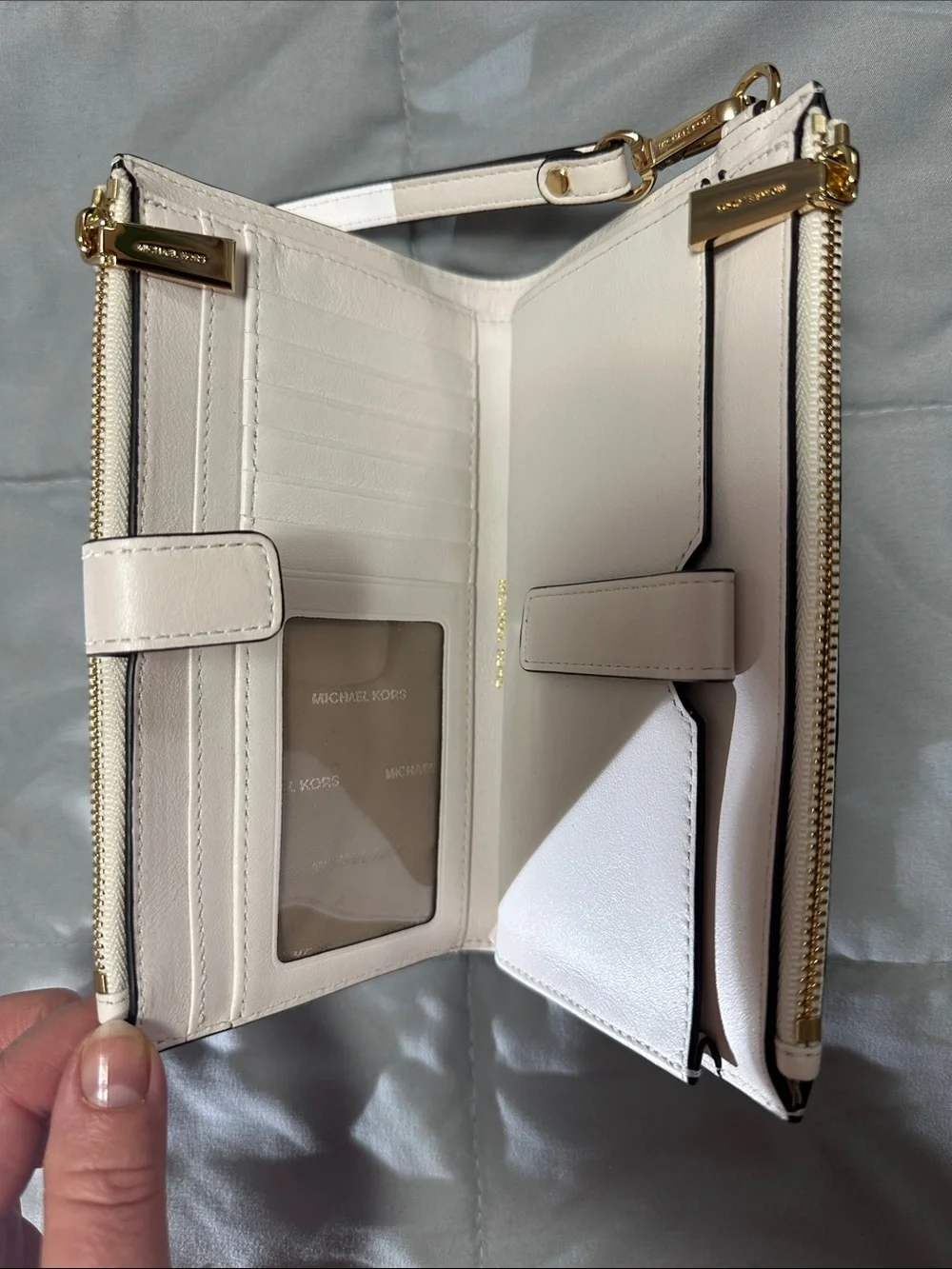Michael Kors White Wristlet with Gold Floral Accents